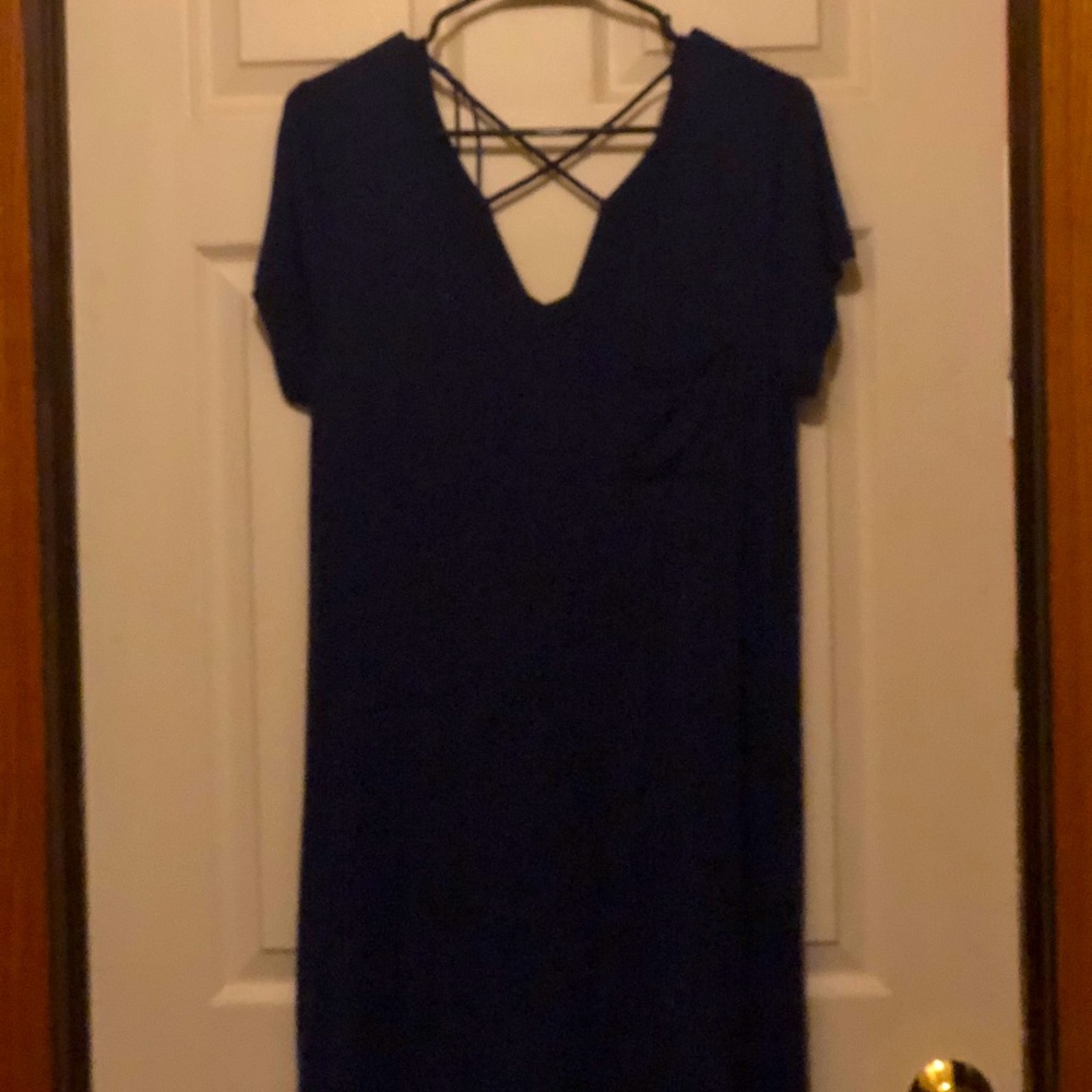 Blue t-shirt dress. Crisscross detailing on back.